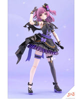 An anime-style action figure of a girl with pink hair wearing a black and purple gothic costume, posed against a light purple background with small white star-like specks.